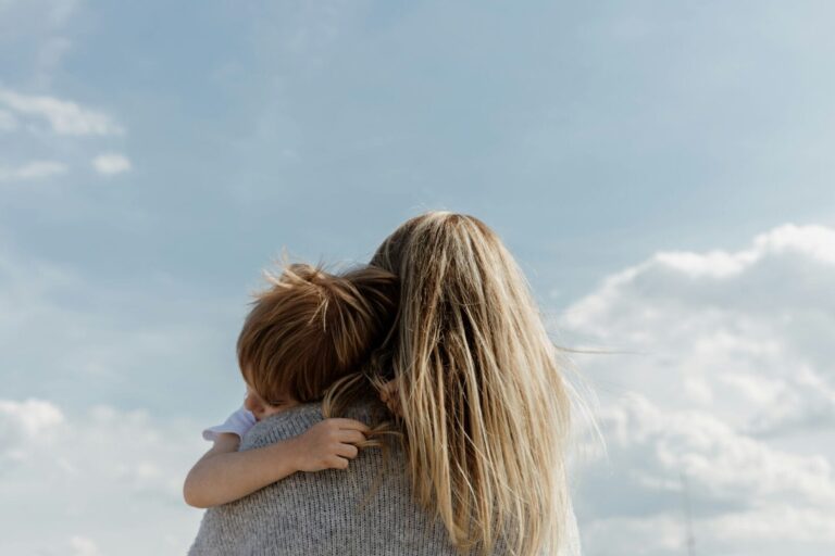 mom hugging child