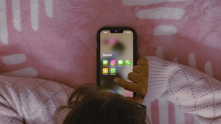teen using social media on smartphone after meta lawsuit